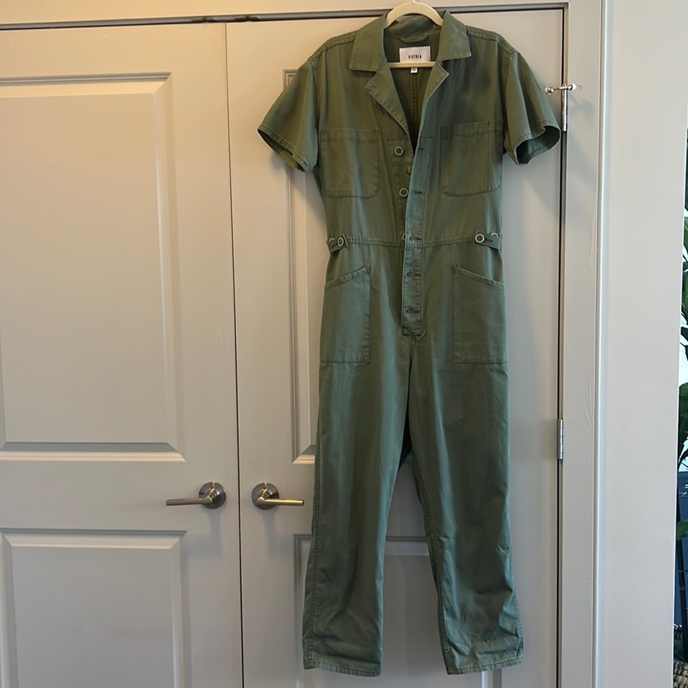 Green jumpsuit. New without tags. Never been worn. Size medium